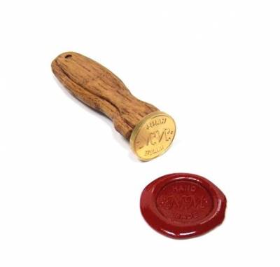 Печать под сургуч диаметром 25 мм с надписью hand made nm в переводе ручная работа  1